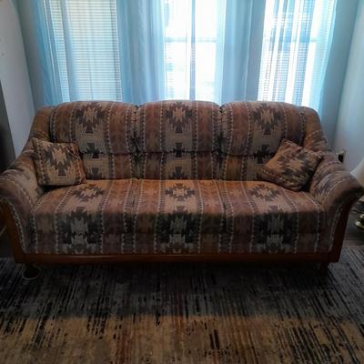 The Loren Mitchell Collection Southwestern style sofa with wood trim front