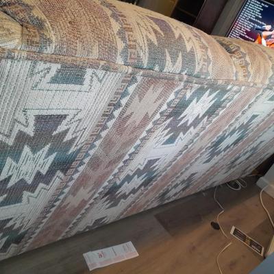 The Loren Mitchell Collection Southwestern style sofa with wood trim front