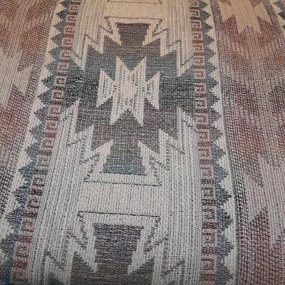 The Loren Mitchell Collection Southwestern style sofa with wood trim front