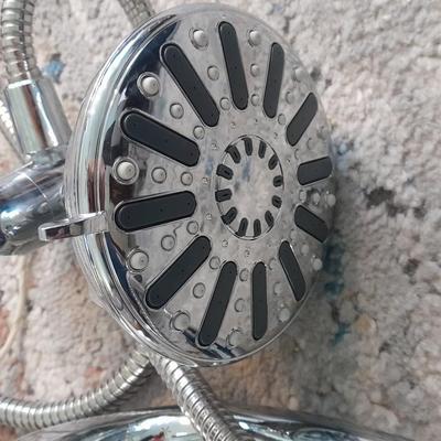 Vick's Humidifier, Glacier Bay shower head, and an electric heating pad