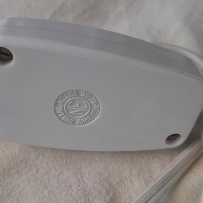 Vick's Humidifier, Glacier Bay shower head, and an electric heating pad