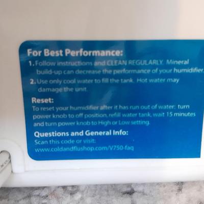 Vick's Humidifier, Glacier Bay shower head, and an electric heating pad