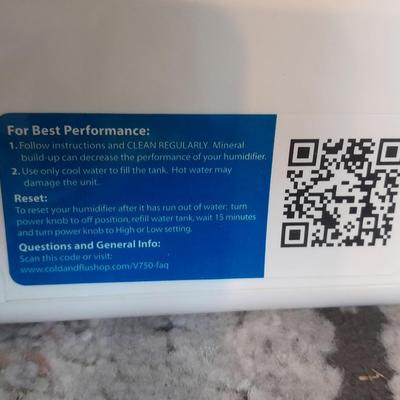 Vick's Humidifier, Glacier Bay shower head, and an electric heating pad