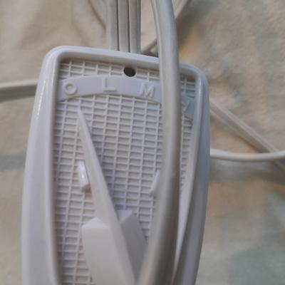 Vick's Humidifier, Glacier Bay shower head, and an electric heating pad