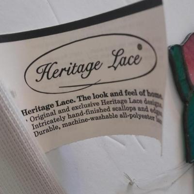 Stained glass window hangings and a small God bless the birds Tapestry.