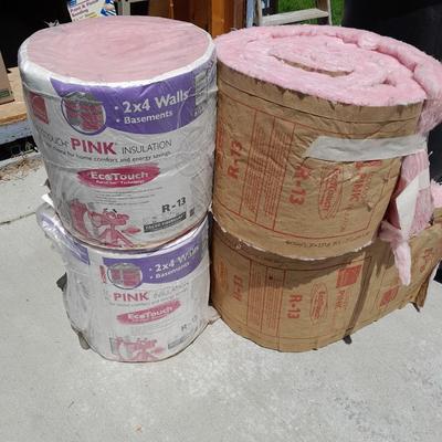 New rolls of R-13 insulation, and two partial rolls