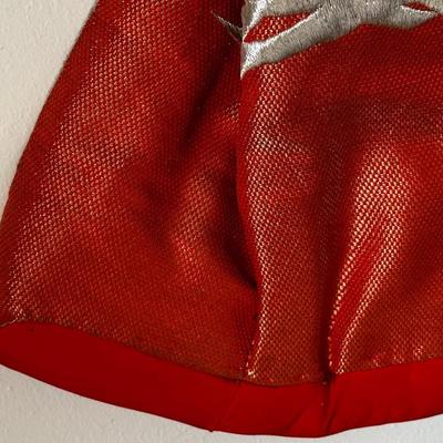 Beautiful red Japanese Uchikake ceremonial kimono featuring embroidered cranes.