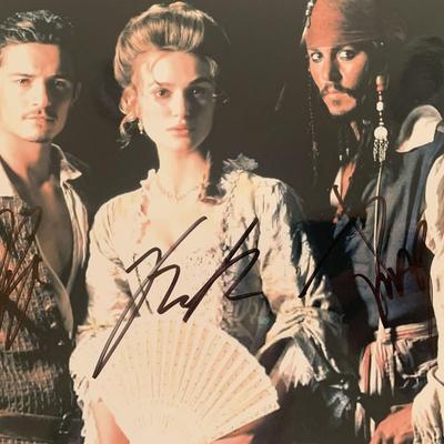 Pirates of the Caribbean cast Orlando Bloom, Johnny Depp, and Keira Knightley signed photo
