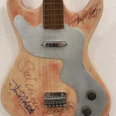 Rare Sex Pistols band signed guitar