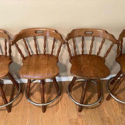 4 wooden swivel barstools
