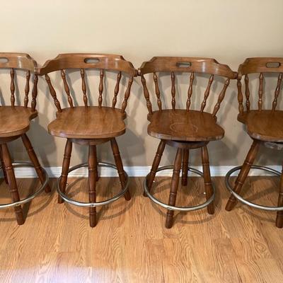 4 wooden swivel barstools
