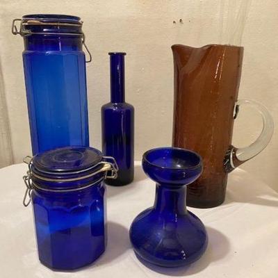 blue glass pasta containers and brown crackle blown glass pitcher martini mixer
