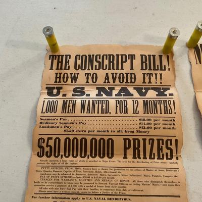Two Very Old Posters With 20 Gauge Shells And Military Utensils