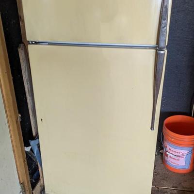 Yellow General Electric Refrigerator