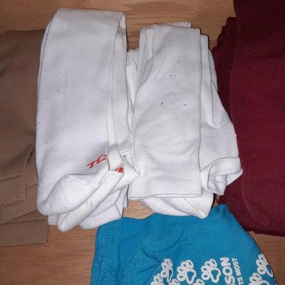 20 Pairs of socks, Black men's New Balance shoes size 11 and shoe polish