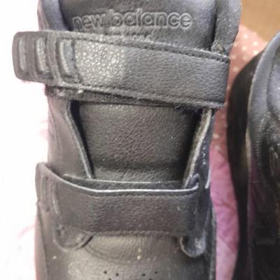 20 Pairs of socks, Black men's New Balance shoes size 11 and shoe polish