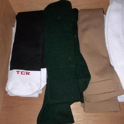 20 Pairs of socks, Black men's New Balance shoes size 11 and shoe polish