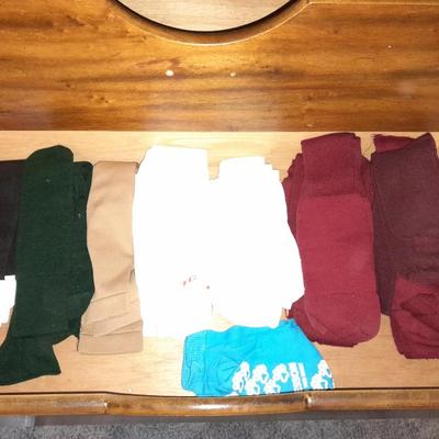 20 Pairs of socks, Black men's New Balance shoes size 11 and shoe polish