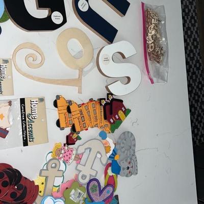 Large lot of wooden arts and craft items.