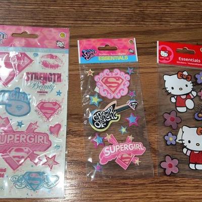 lot of 3 superwomen and hello kitty