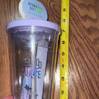 cup and straw with chap stick