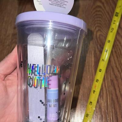 cup and straw with chap stick