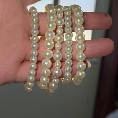 lot of pearl bracelets
