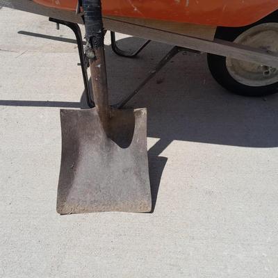 Wheelbarrow and shovel