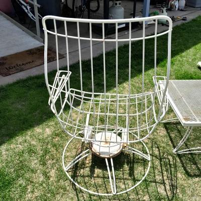 Two Vintage Metal High back Homecrest Swivel chairs with cushions and a small table