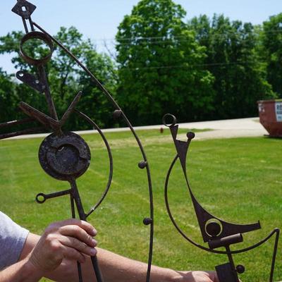 YARD ART. PAIR POLE SCULPTURES WITH ABSTRACT FINIALS. 5FT