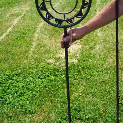 METAL YARD ART. SUN SCULPTURE FORM ON METAL POLE// SPRINKLER. ( HOOKS TO A HOSE)