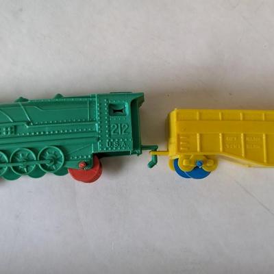 Auburn and Varied Plastic Toys