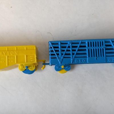 Auburn and Varied Plastic Toys