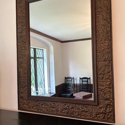 A Large, Embossed Tin Framed Mirror