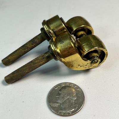 PAIR BRASS 3â€ TALL CASTERS