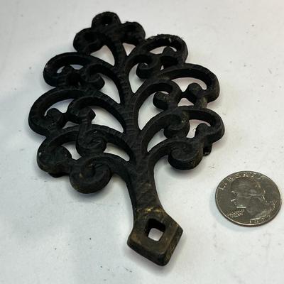 ANTIQUE IRON TRIVET 5â€ LONG