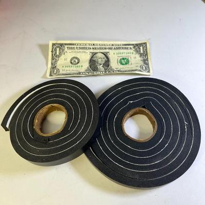 WEATHERIZING STRIP WITH ADHESIVE