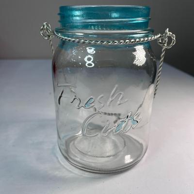 OLD TIME GLASS JAR WITH WIRE HANGER 