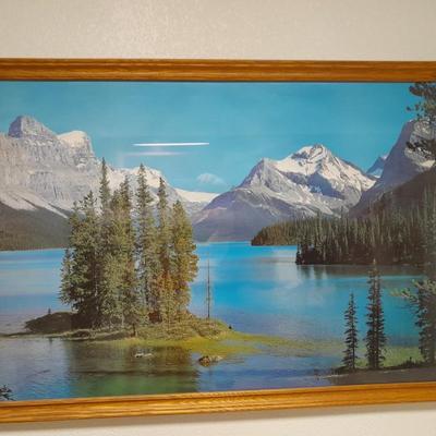 large mountain lake framed artwork and smaller waterfall picture
