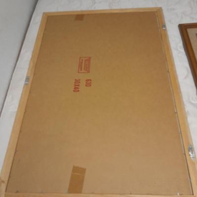 large mountain lake framed artwork and smaller waterfall picture