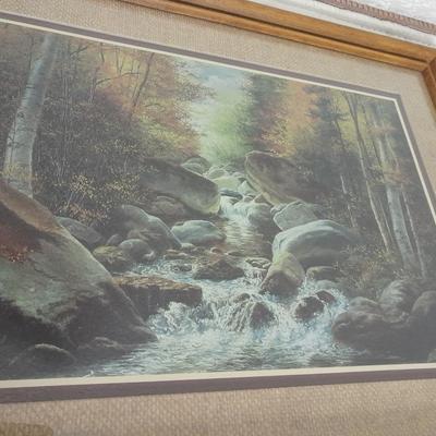 large mountain lake framed artwork and smaller waterfall picture