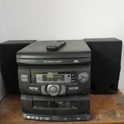 Sharp Stereo system 3 CD changer am/fm dual cassette w/ remote.