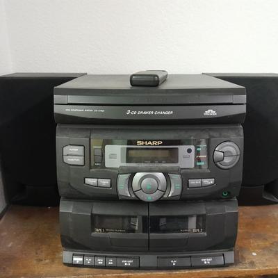 Sharp Stereo system 3 CD changer am/fm dual cassette w/ remote.