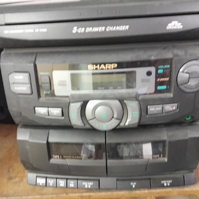 Sharp Stereo system 3 CD changer am/fm dual cassette w/ remote.
