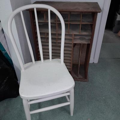 Antique Storage Accessory Cabinet Fixed Shelves with white wooden chair