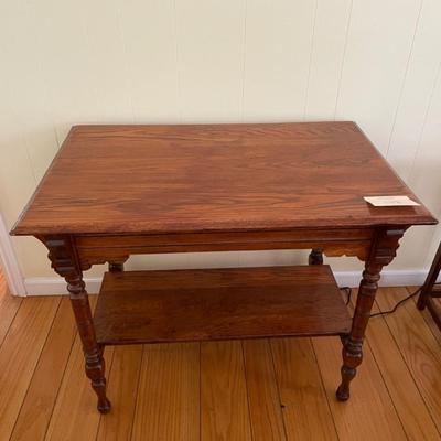 Antique oak table with shelf