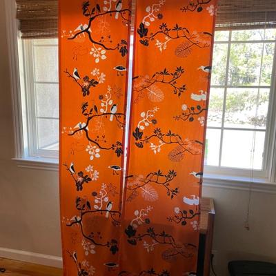 Set of pillows and matching curtains