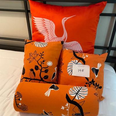 Set of pillows and matching curtains