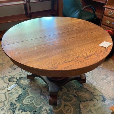 Oak pedestal dining table