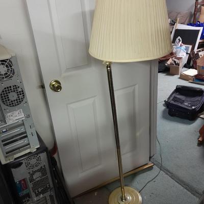 Brass Floor lamp with adjustable swing movement and lamp shade